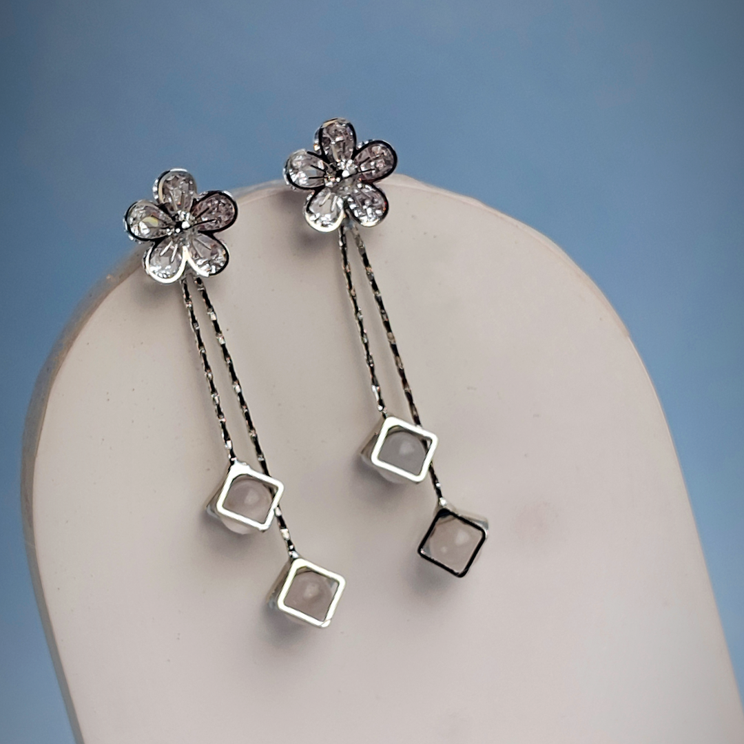 WHITE CRYSTAL FLOWER DROPLET EARRING-Adorelane