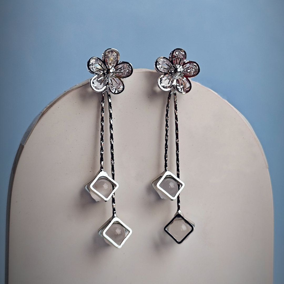 WHITE CRYSTAL FLOWER DROPLET EARRING-Adorelane