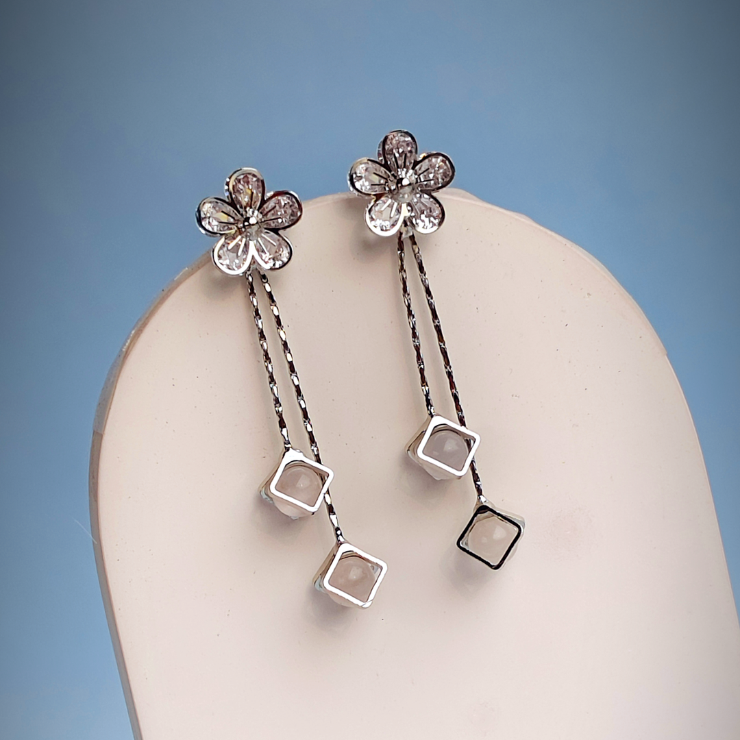 WHITE CRYSTAL FLOWER DROPLET EARRING-Adorelane