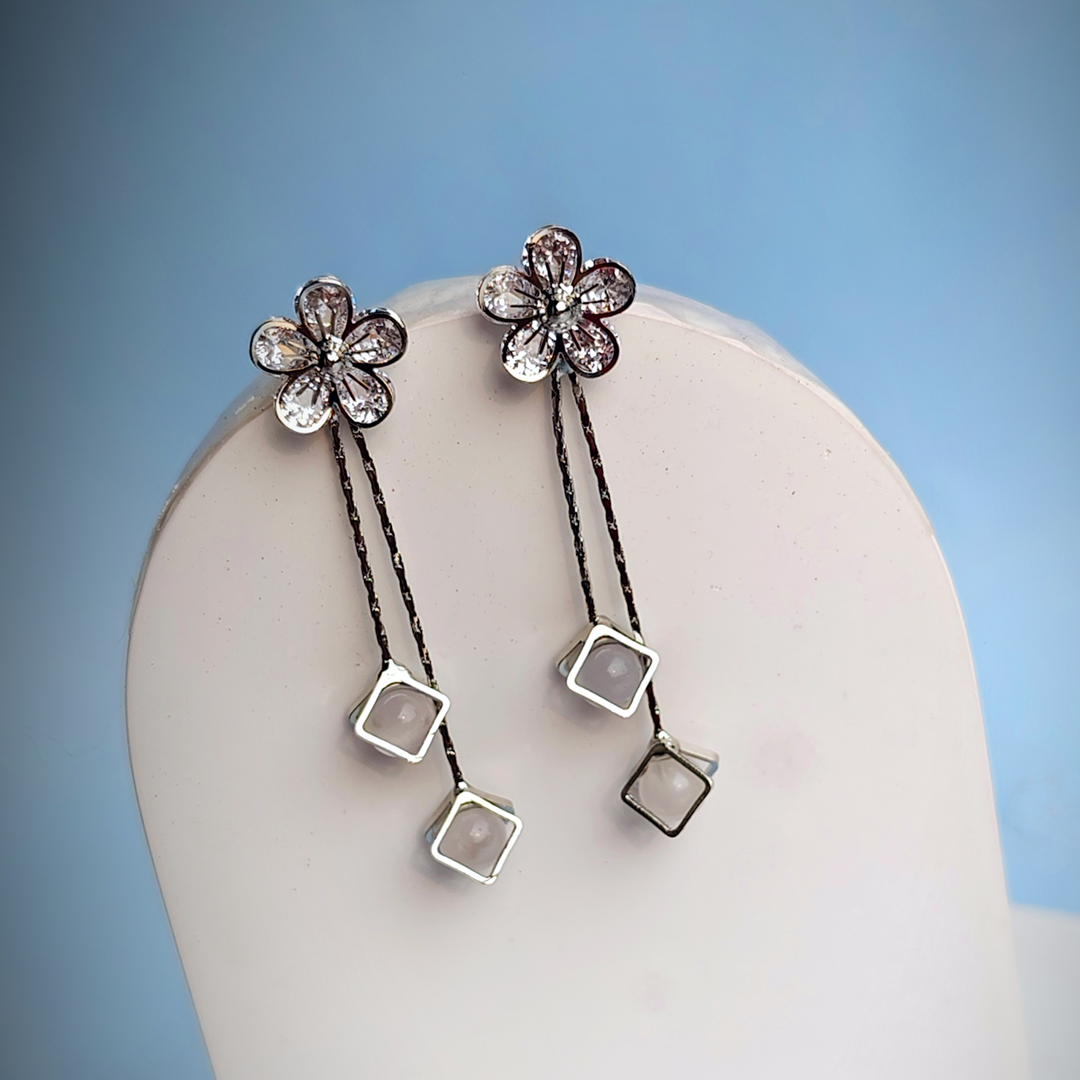 WHITE CRYSTAL FLOWER DROPLET EARRING-Adorelane