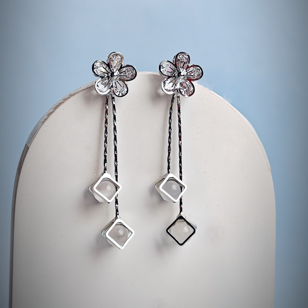 WHITE CRYSTAL FLOWER DROPLET EARRING-Adorelane