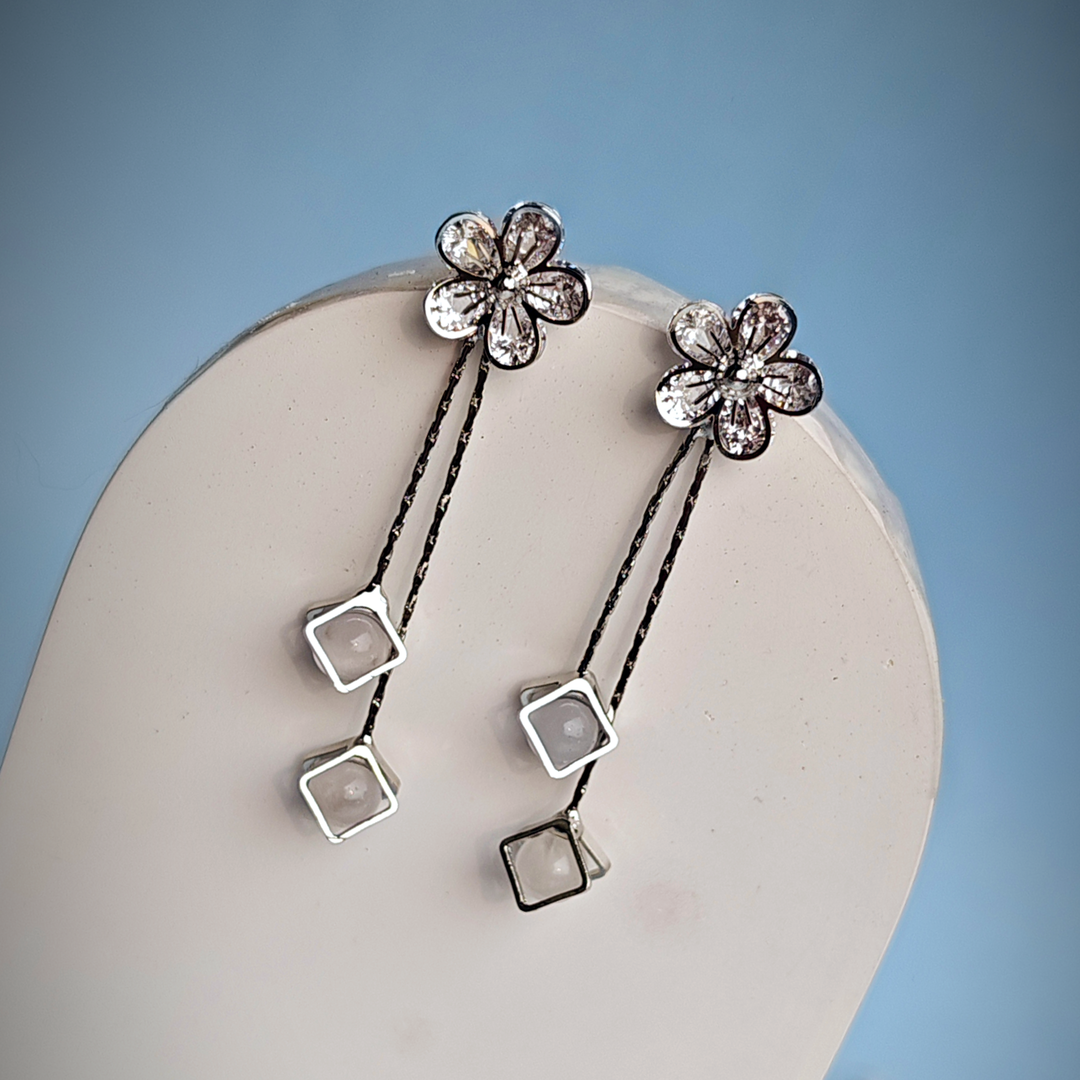 WHITE CRYSTAL FLOWER DROPLET EARRING-Adorelane