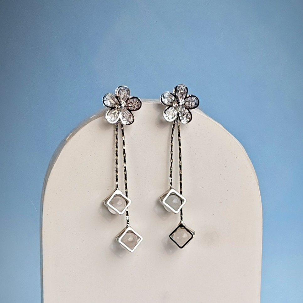 WHITE CRYSTAL FLOWER DROPLET EARRING-Adorelane